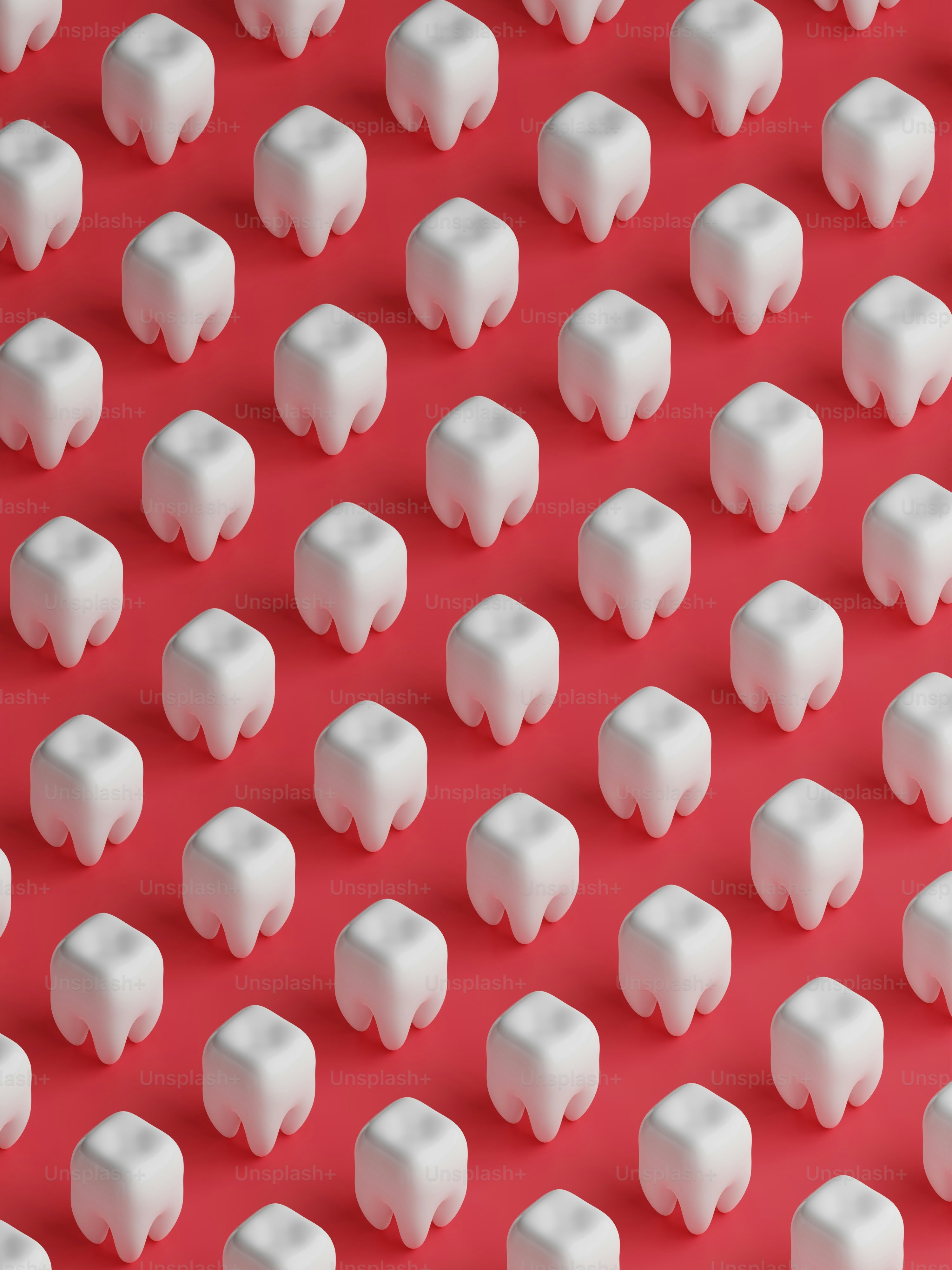 a group of white objects on a red background