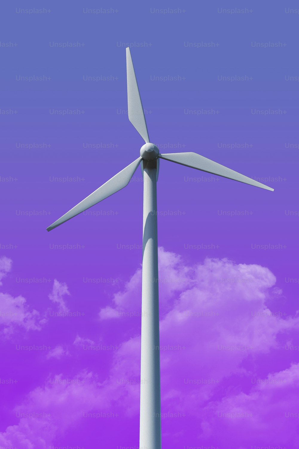 a wind turbine in the middle of a purple sky