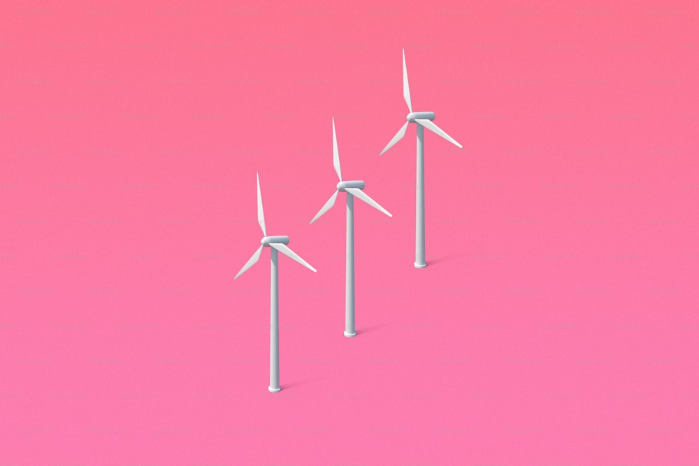 three wind turbines on a pink background