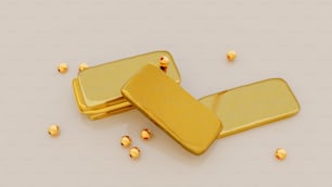 Un par de objetos chapados en oro colocados uno encima del otro