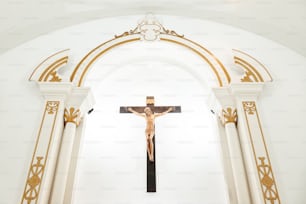 a crucifix in the middle of a church