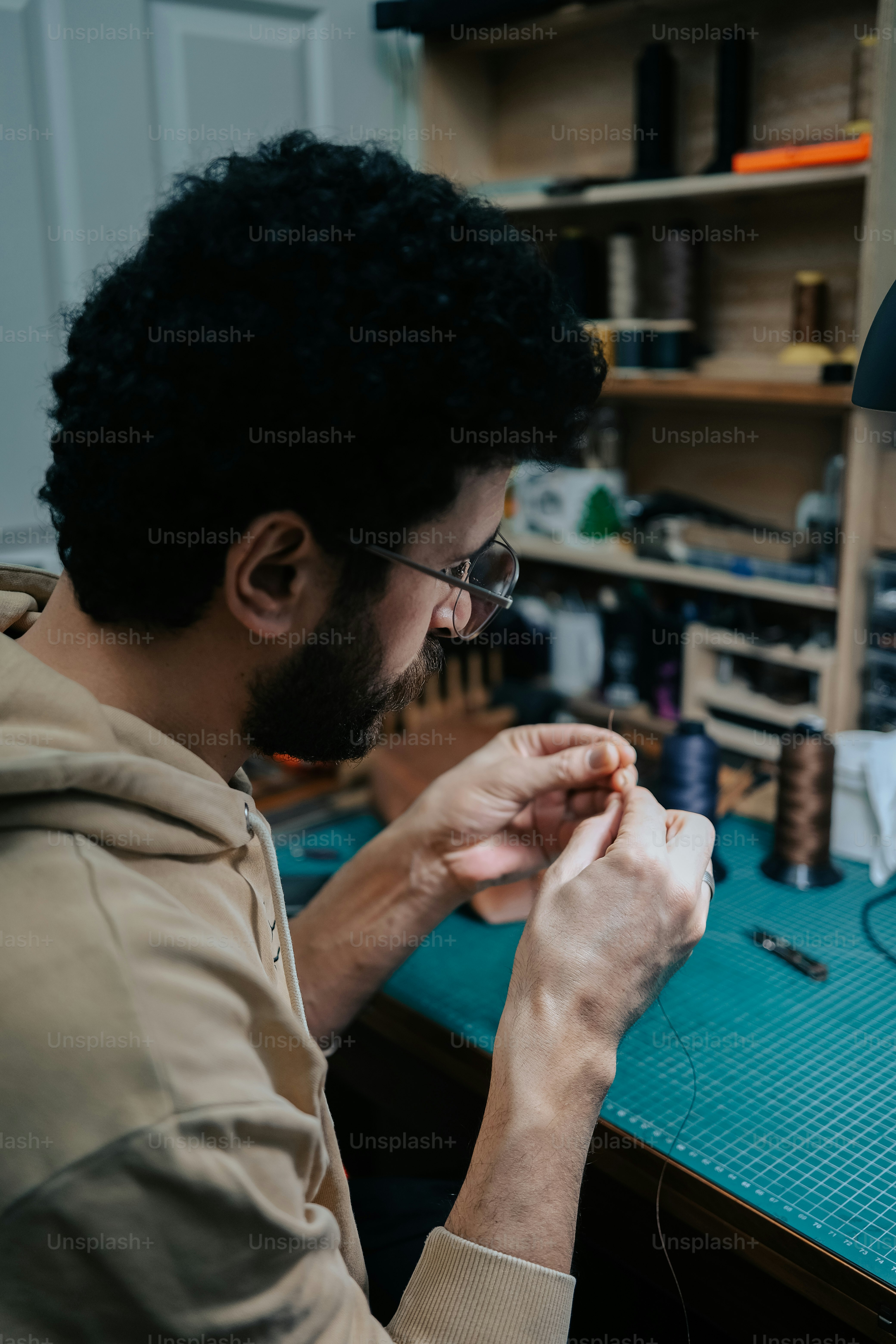 a man is working on a piece of paper