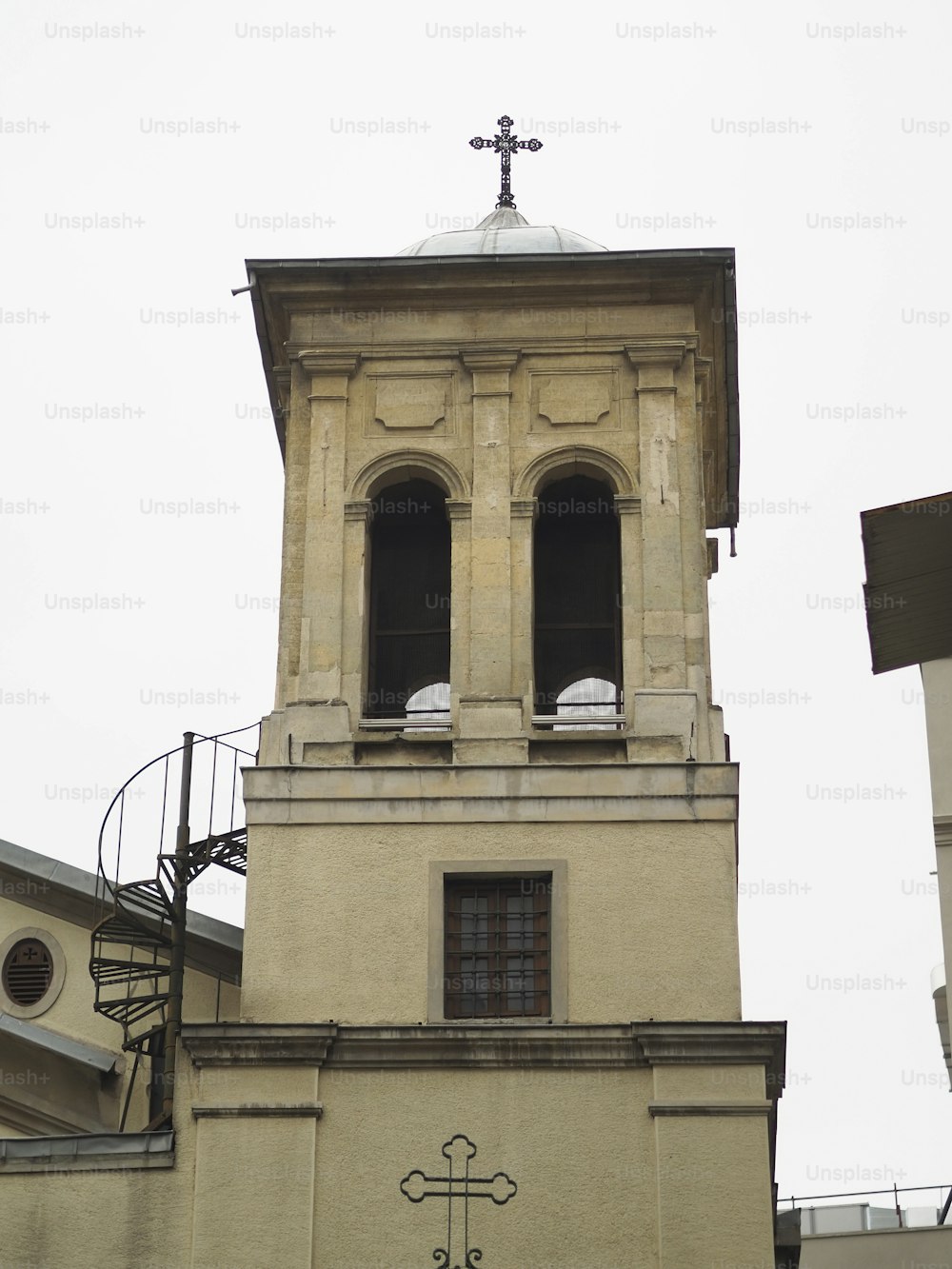 a tall building with a clock on the front of it