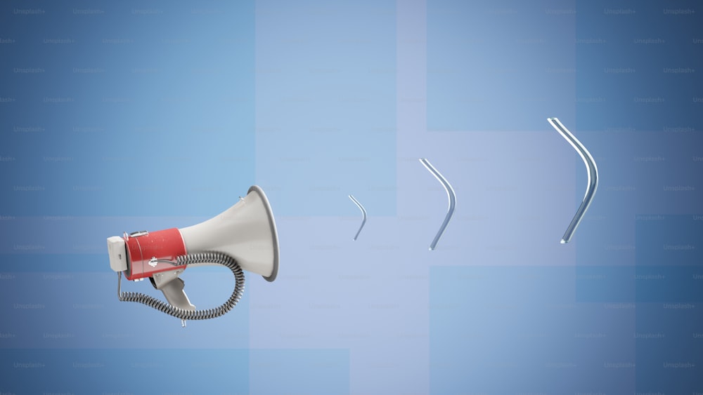 a red and white megaphone next to a blue background