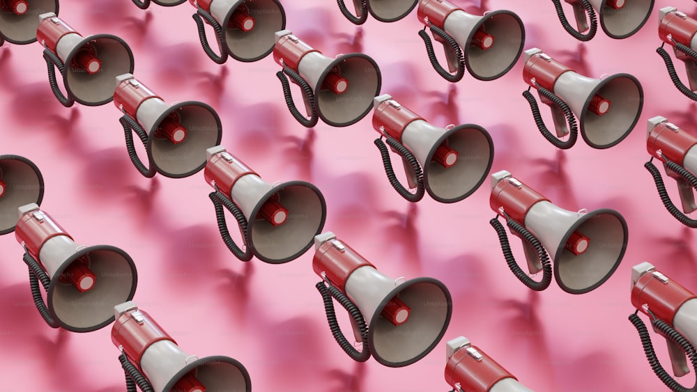 a large group of red and white megaphones