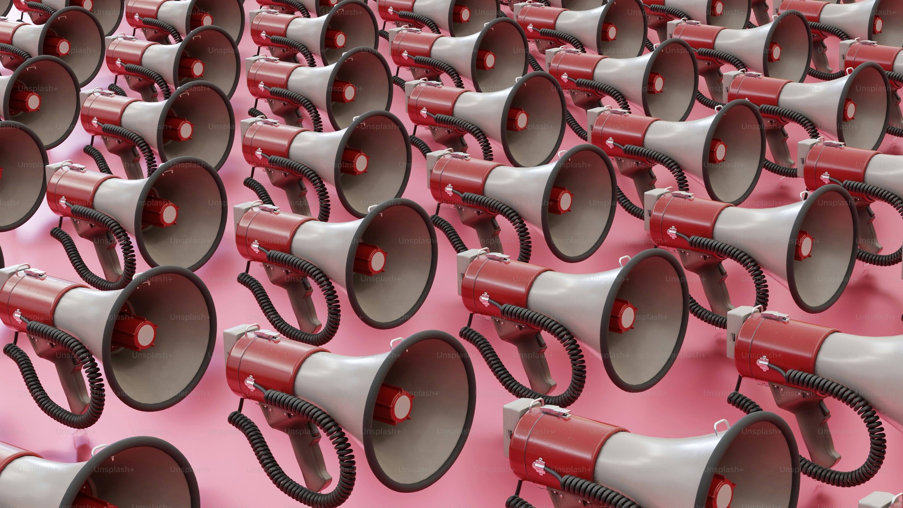 a large group of red and white megaphones