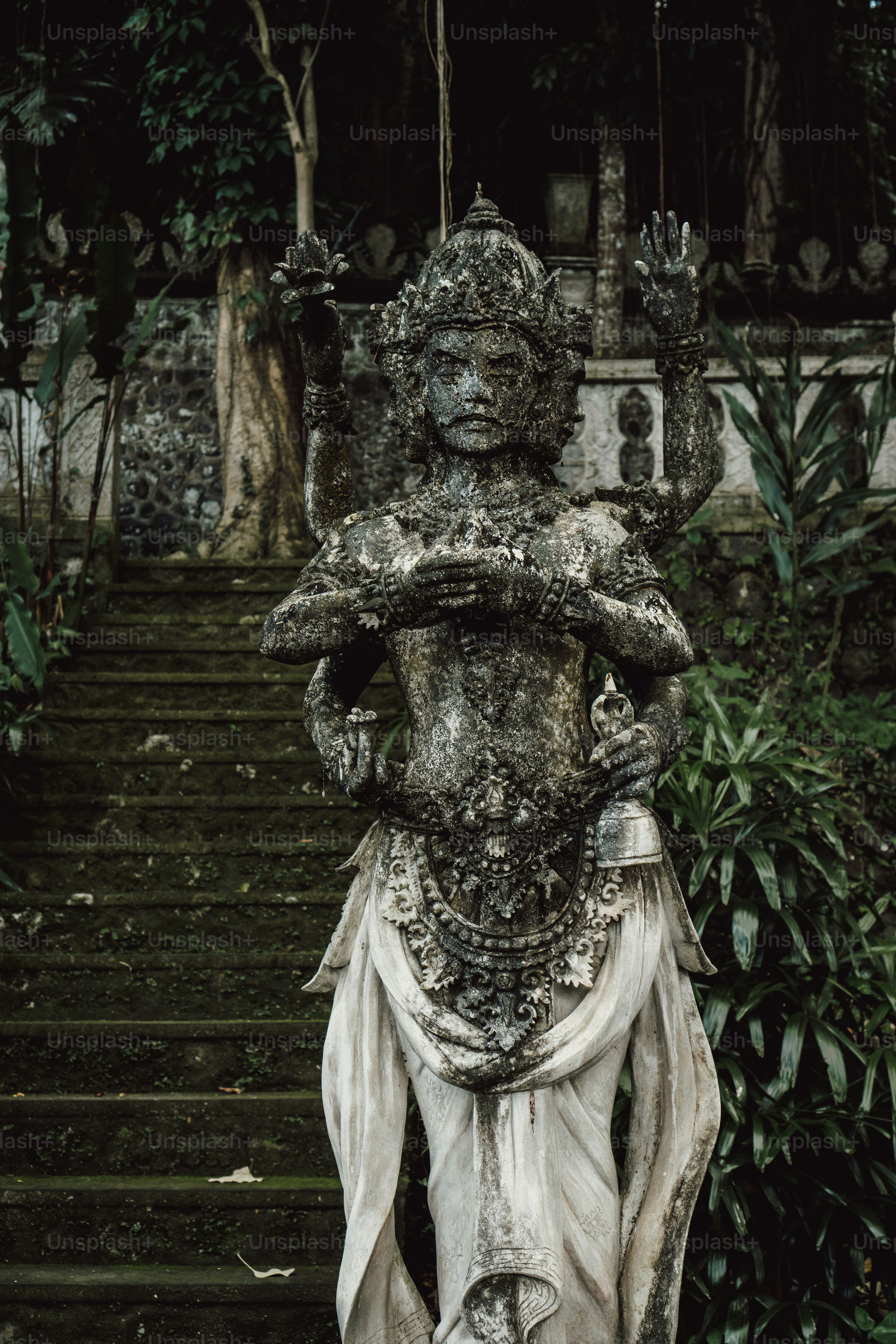 a statue of a woman holding a baby in her arms