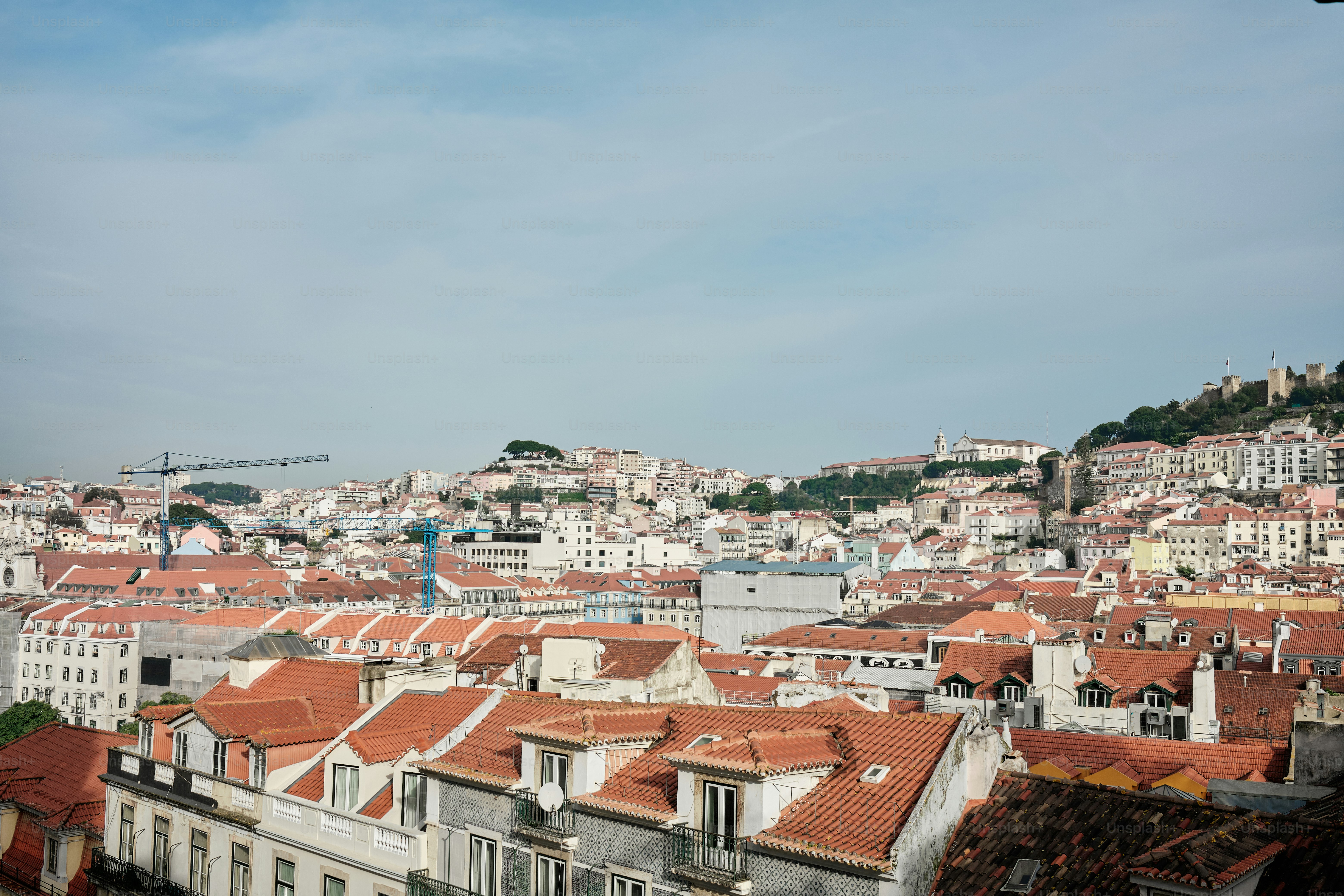 a view of a city from the top of a hill