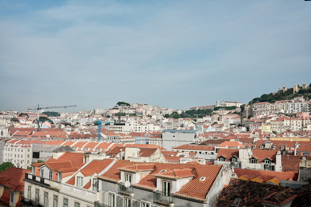 a view of a city from the top of a hill