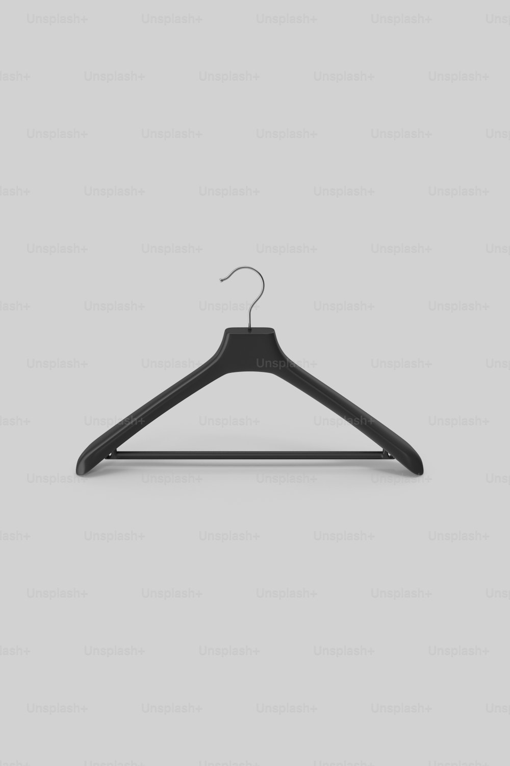 a black hanger on a gray background