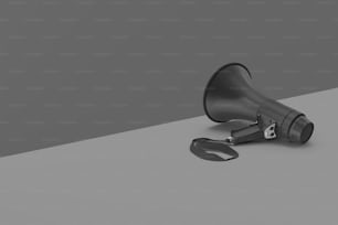 a black megaphone sitting on top of a table