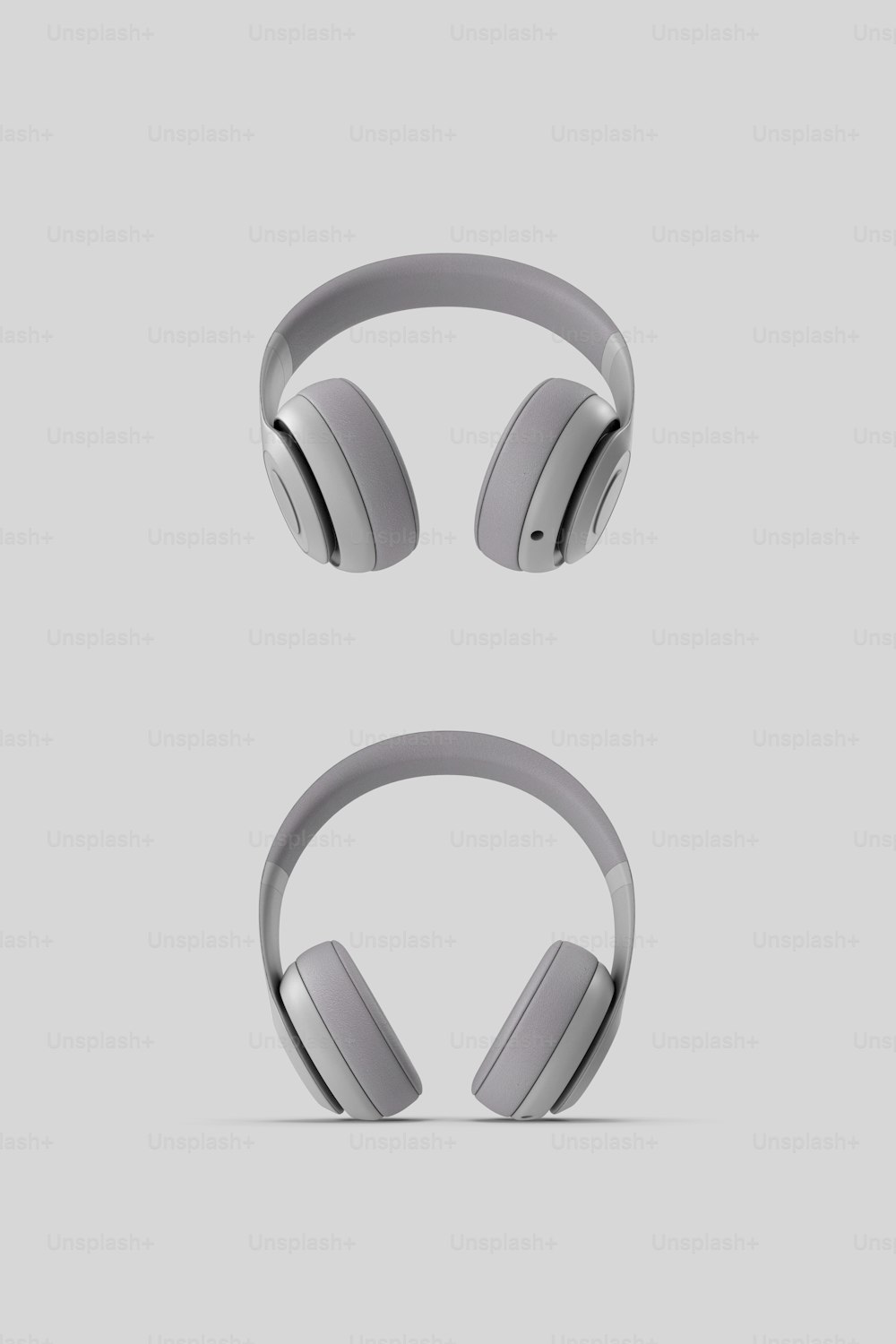 a pair of headphones sitting on top of each other