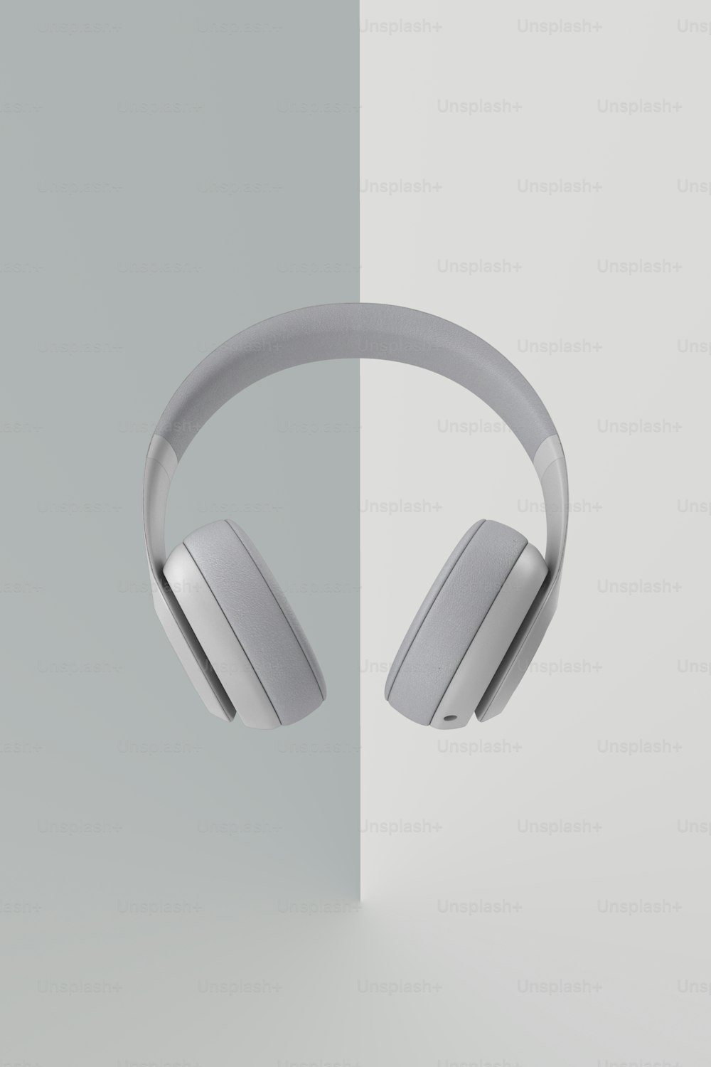 a pair of headphones sitting next to each other