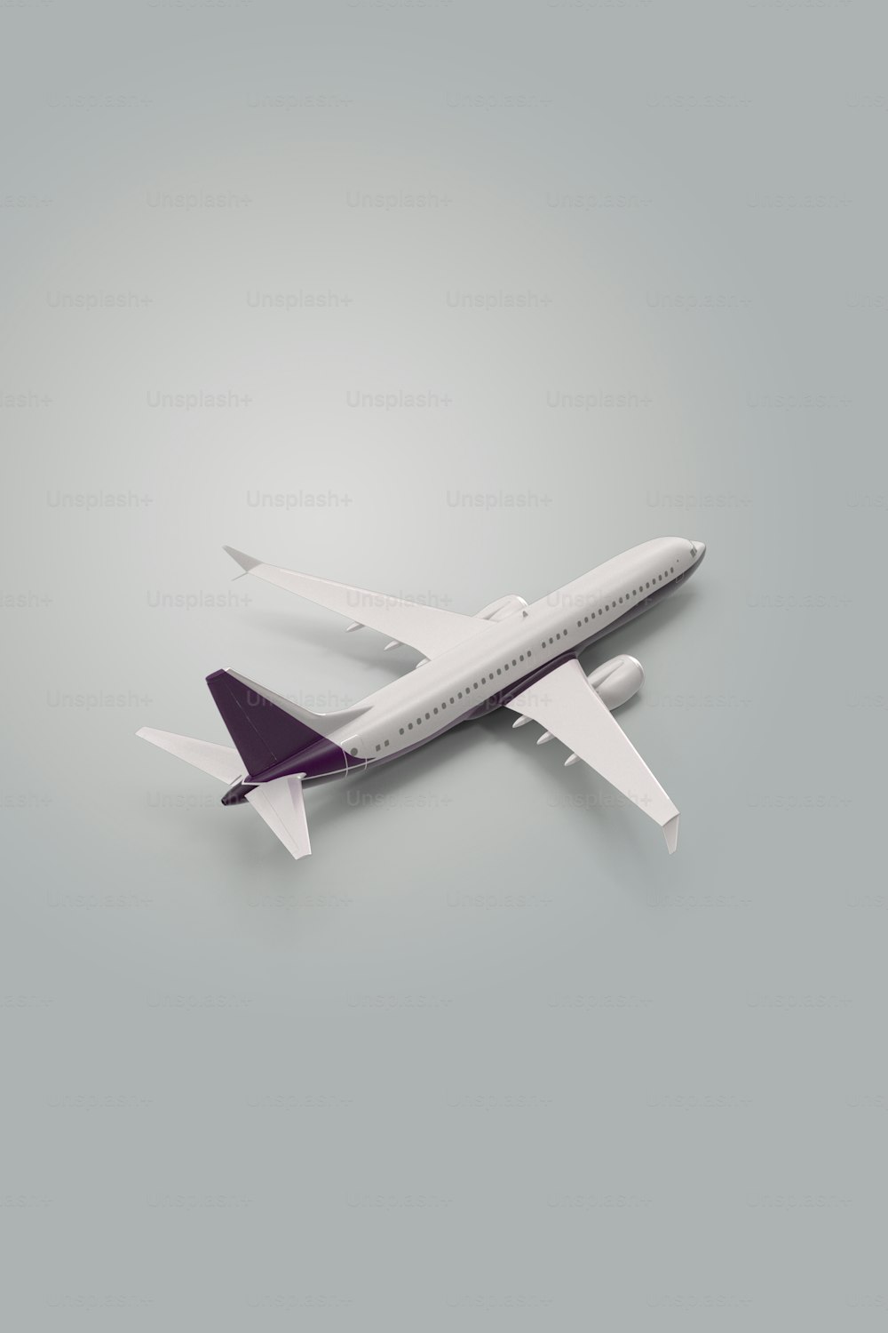 a model of an airplane on a gray background