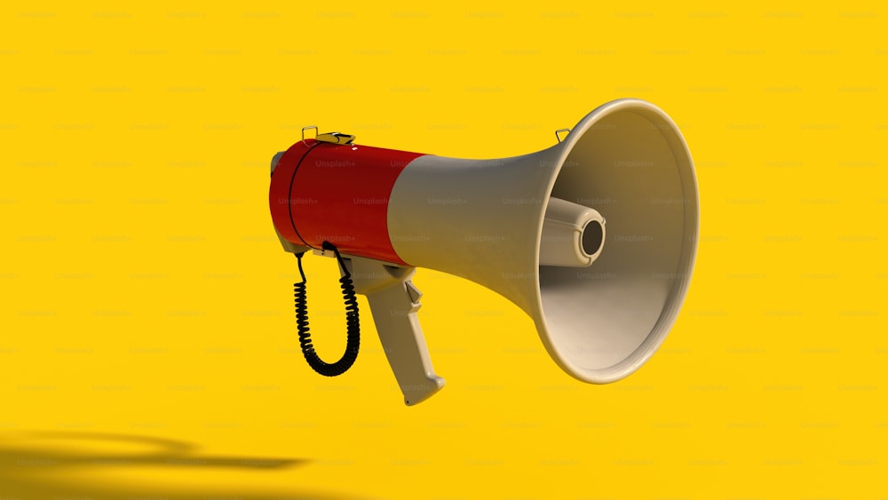 a red and white megaphone on a yellow background