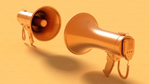 a gold megaphone and a gold speaker on a yellow background