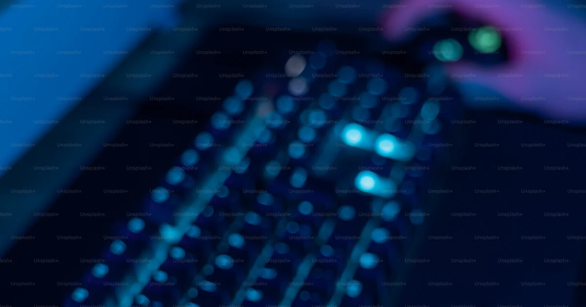 A person typing on a computer keyboard at night photo – Tech Image on ...