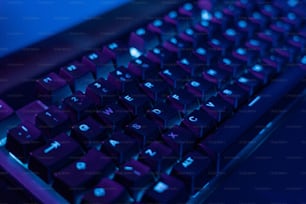 a close up of a keyboard with a blue background