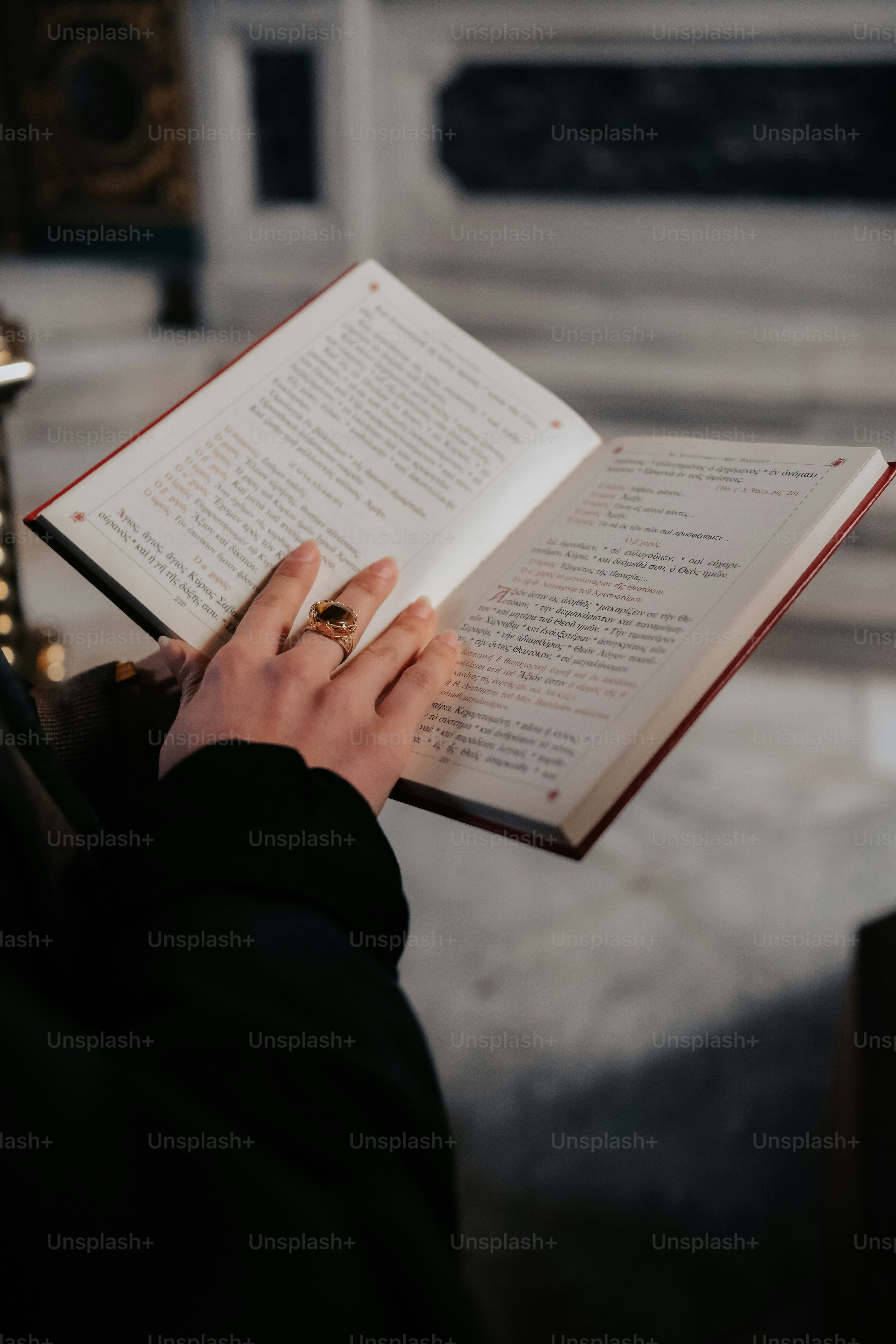 a person holding a book in their hands