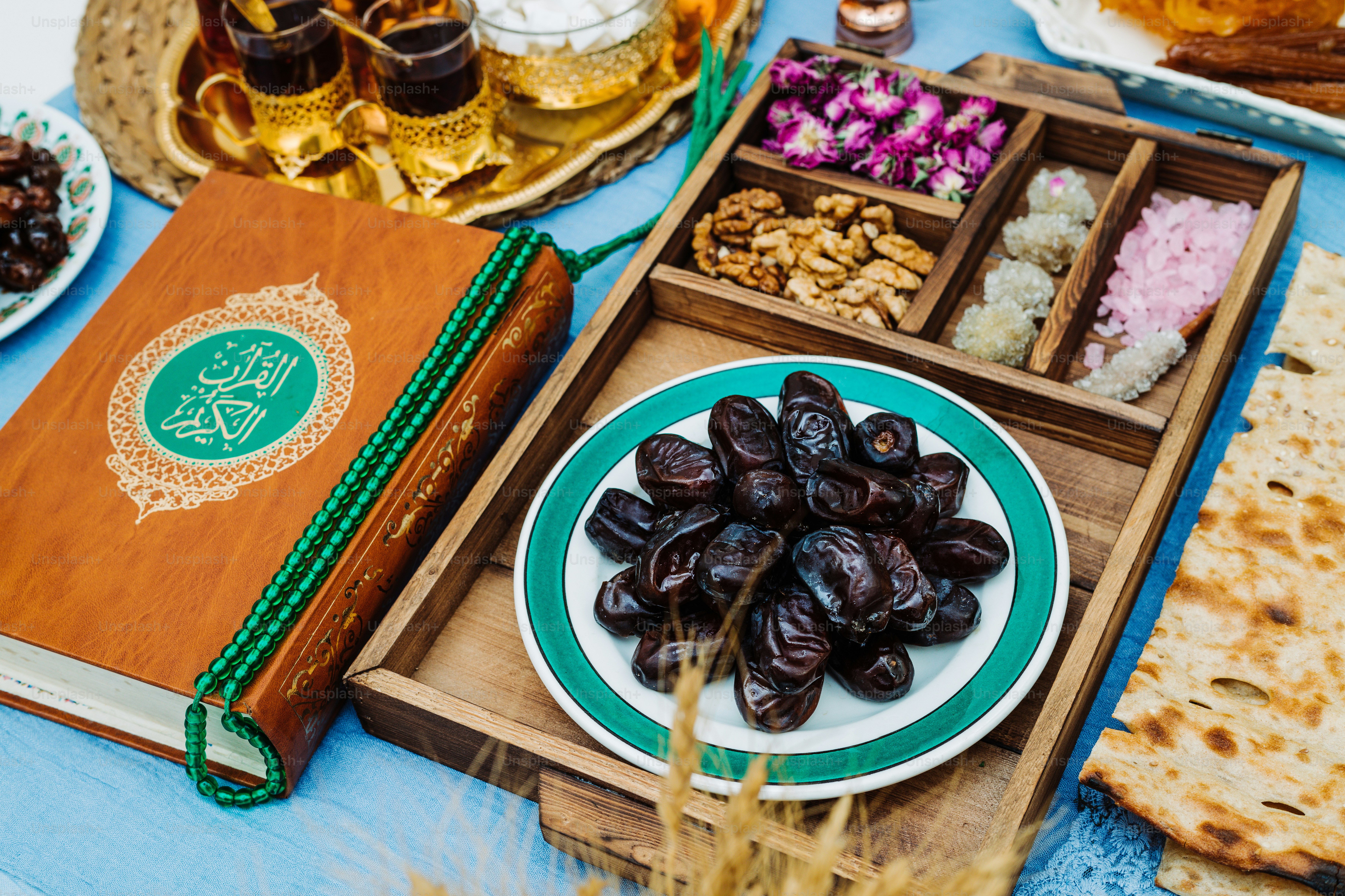 an assortment of food on a table with a book