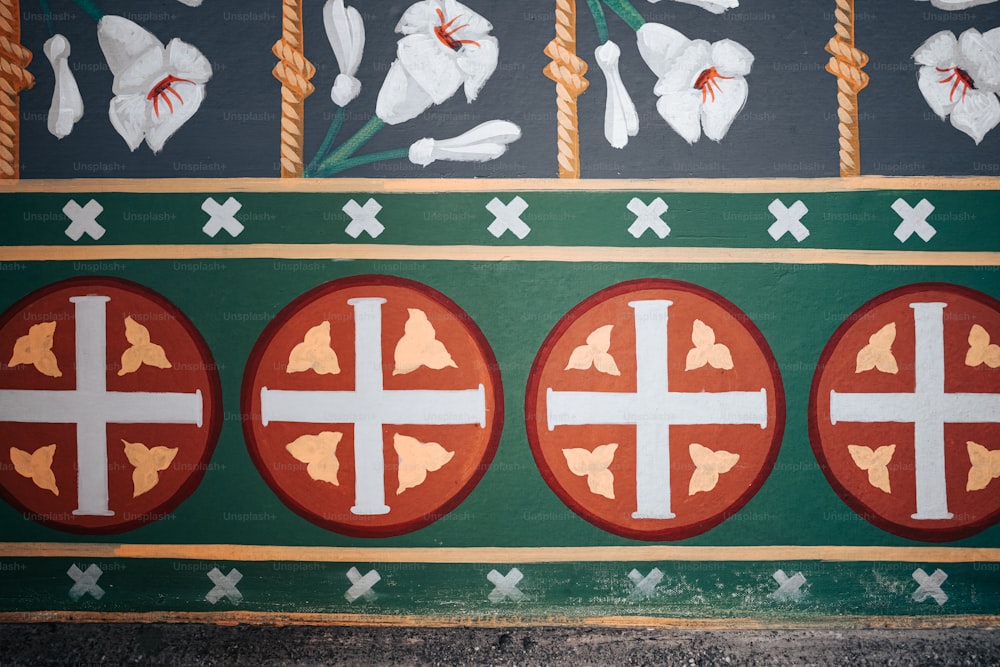 a close up of a wall with flowers on it