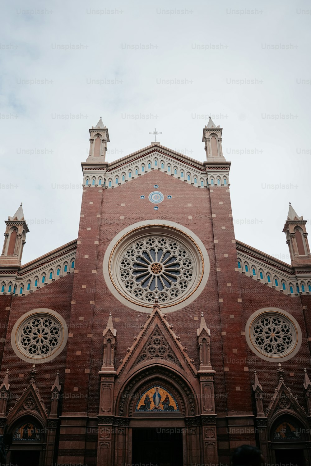 a large church with a clock on the front of it