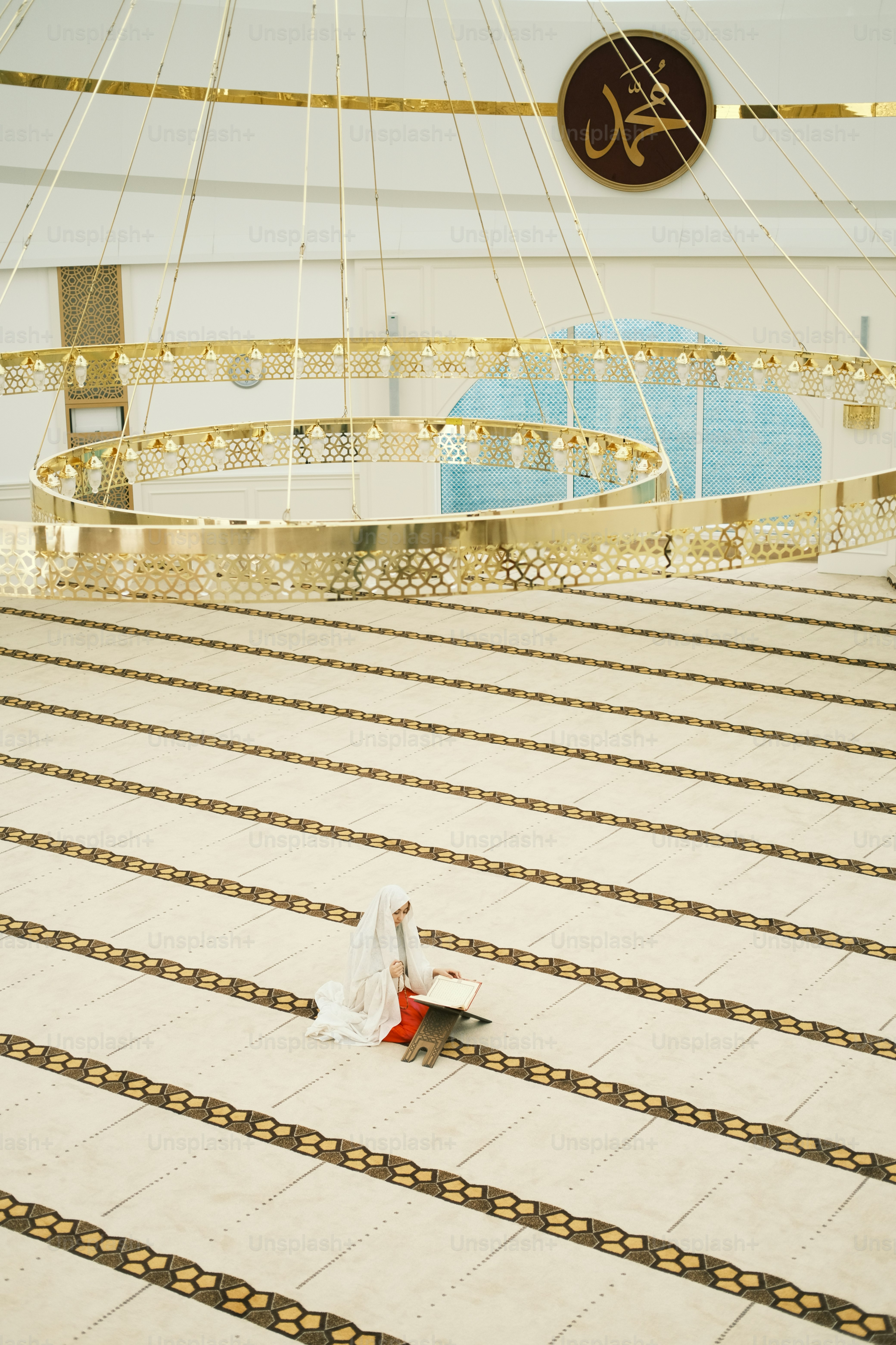 a person sitting on the floor of a building
