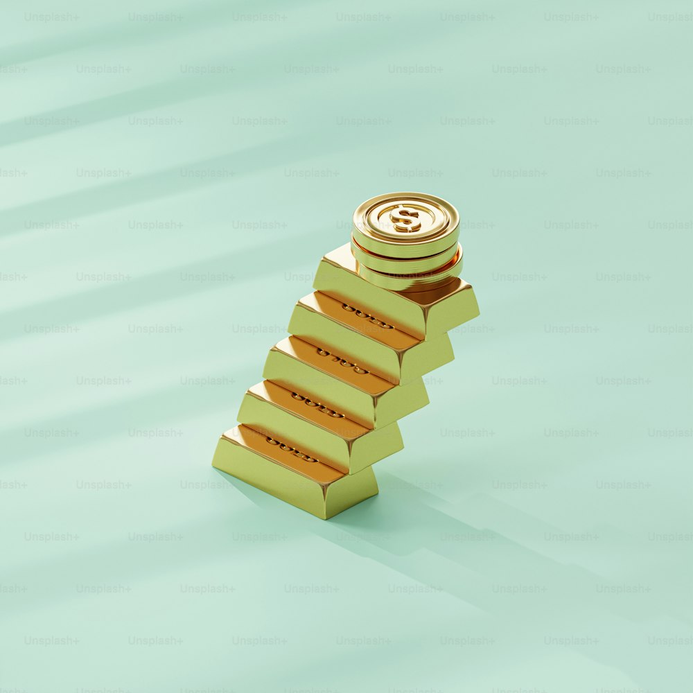 a stack of gold bars with a coin on top