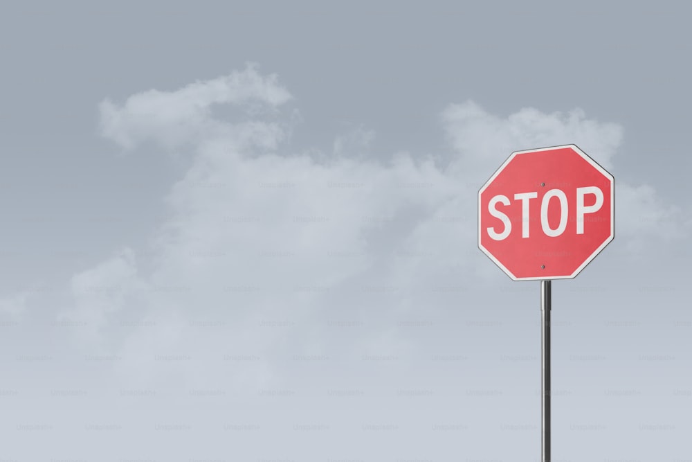 a red stop sign sitting on top of a metal pole