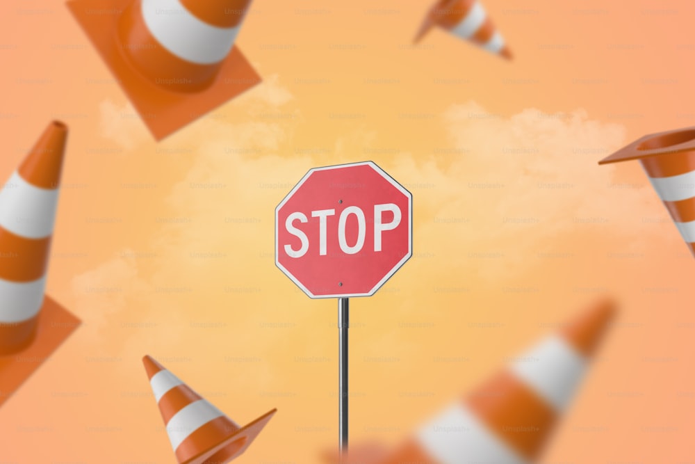 a stop sign surrounded by traffic cones