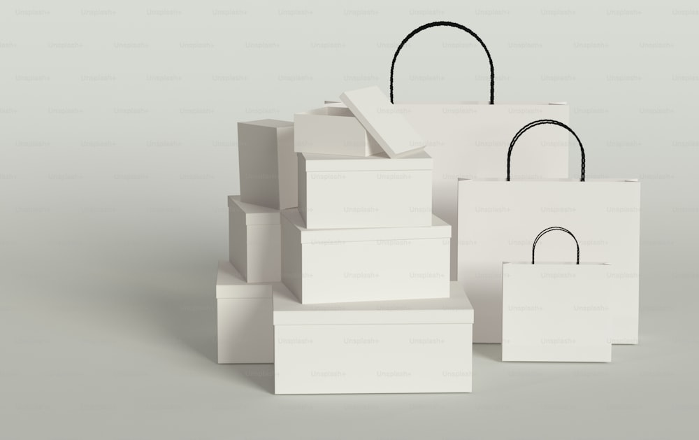 a stack of white boxes with a black handle