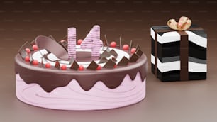 um bolo rosa e preto ao lado de uma caixa preta e branca