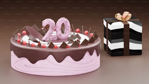um bolo de aniversário com velas e uma caixa de presente