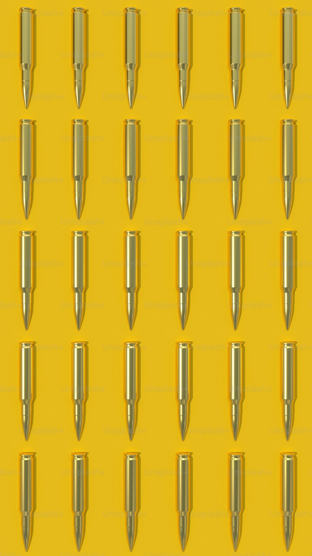 a yellow background with a bunch of bullet like objects