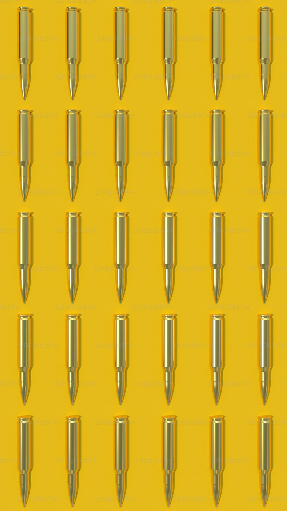 a yellow background with a bunch of bullet like objects