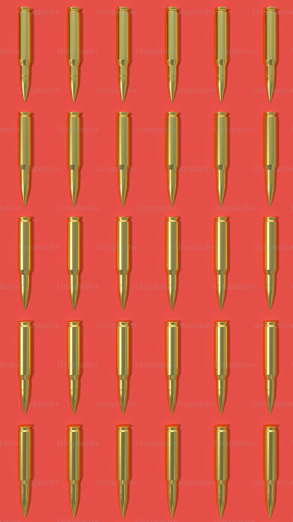 um fundo vermelho com formas de bala de ouro