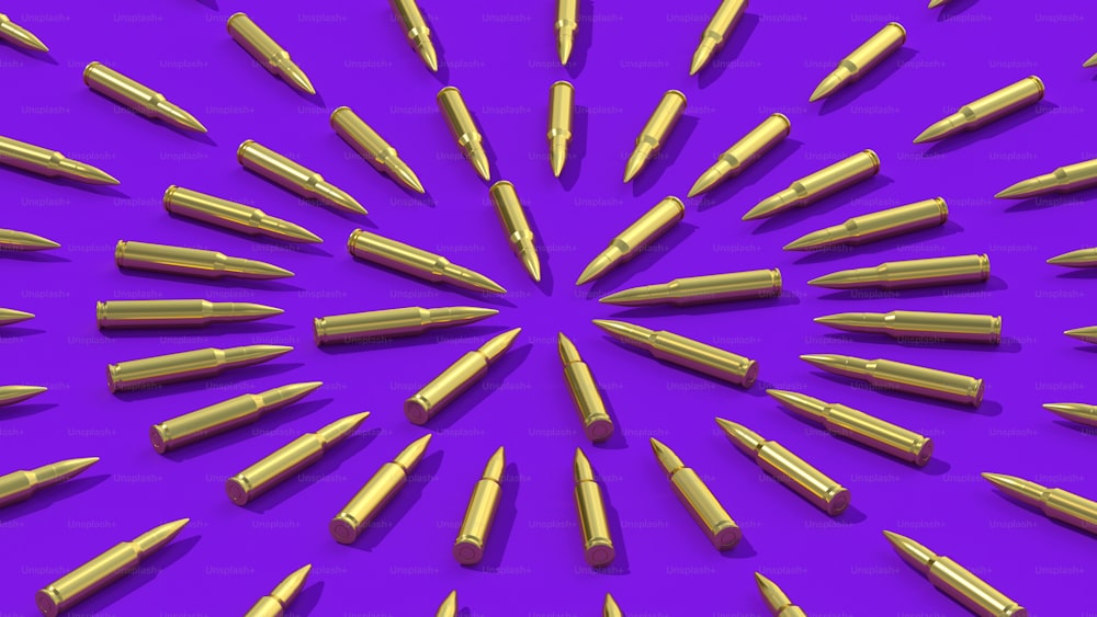 un fond violet avec un bouquet de stylos dorés disposés en cercle