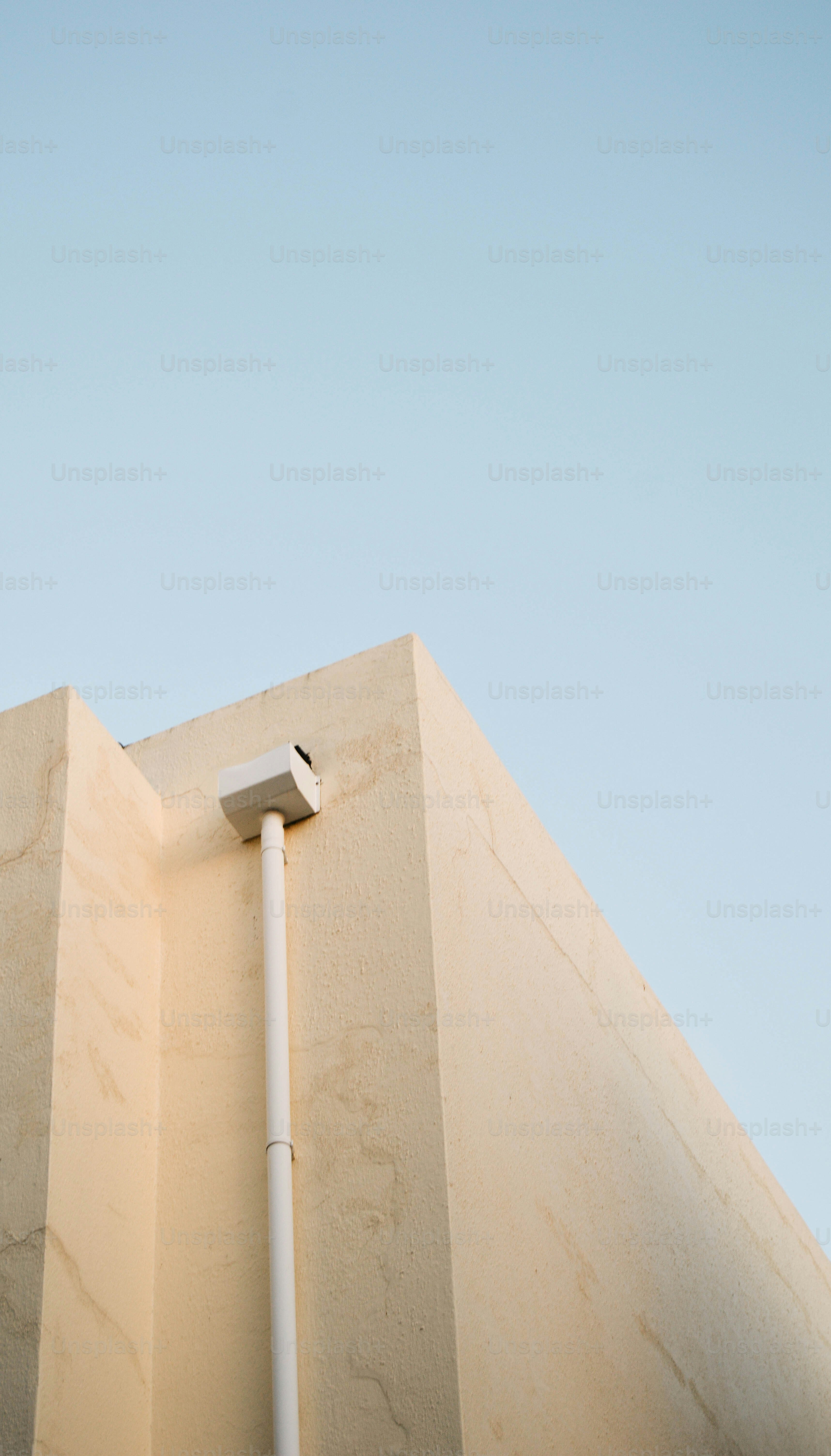 the corner of a building with a street light on it