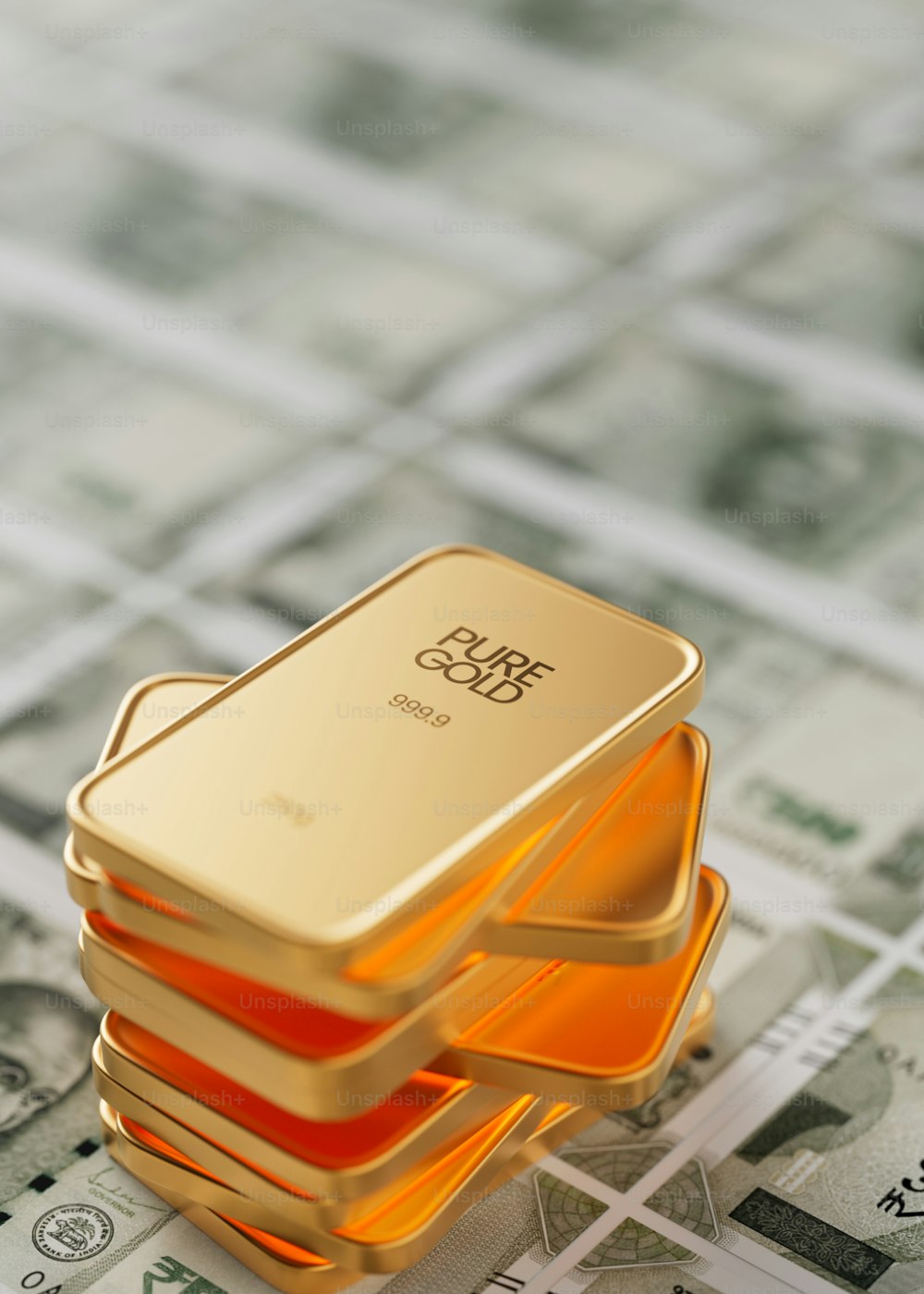 a stack of gold bars sitting on top of a pile of money