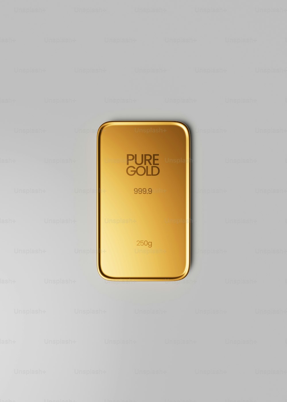 a gold bar on a white surface