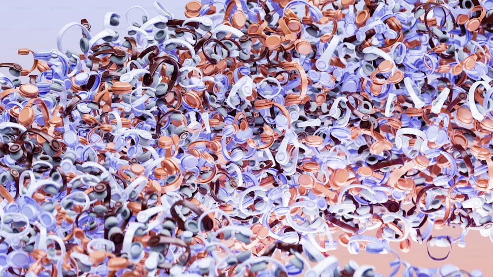 a large pile of purple and silver confetti