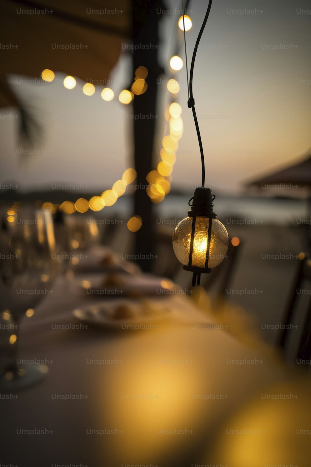 a table with a light hanging from it