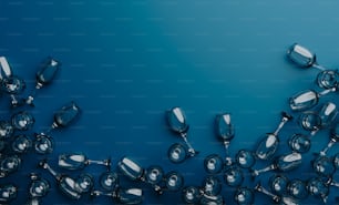 a blue background with a bunch of silver objects