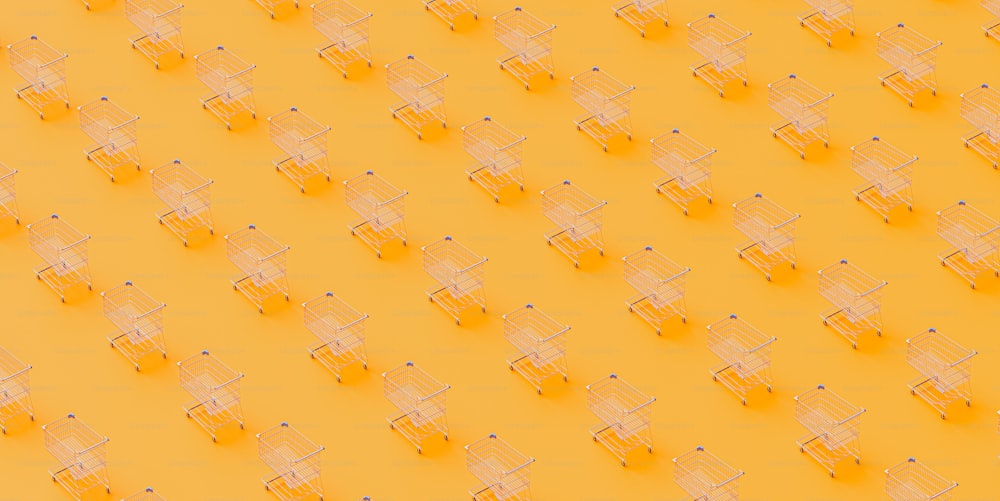 黄色い床の上に座っている小さなカートのグループ