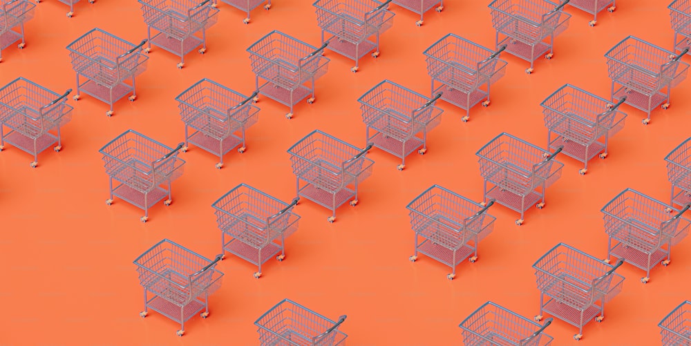 a group of shopping carts on an orange background