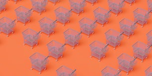 a group of shopping carts on an orange background