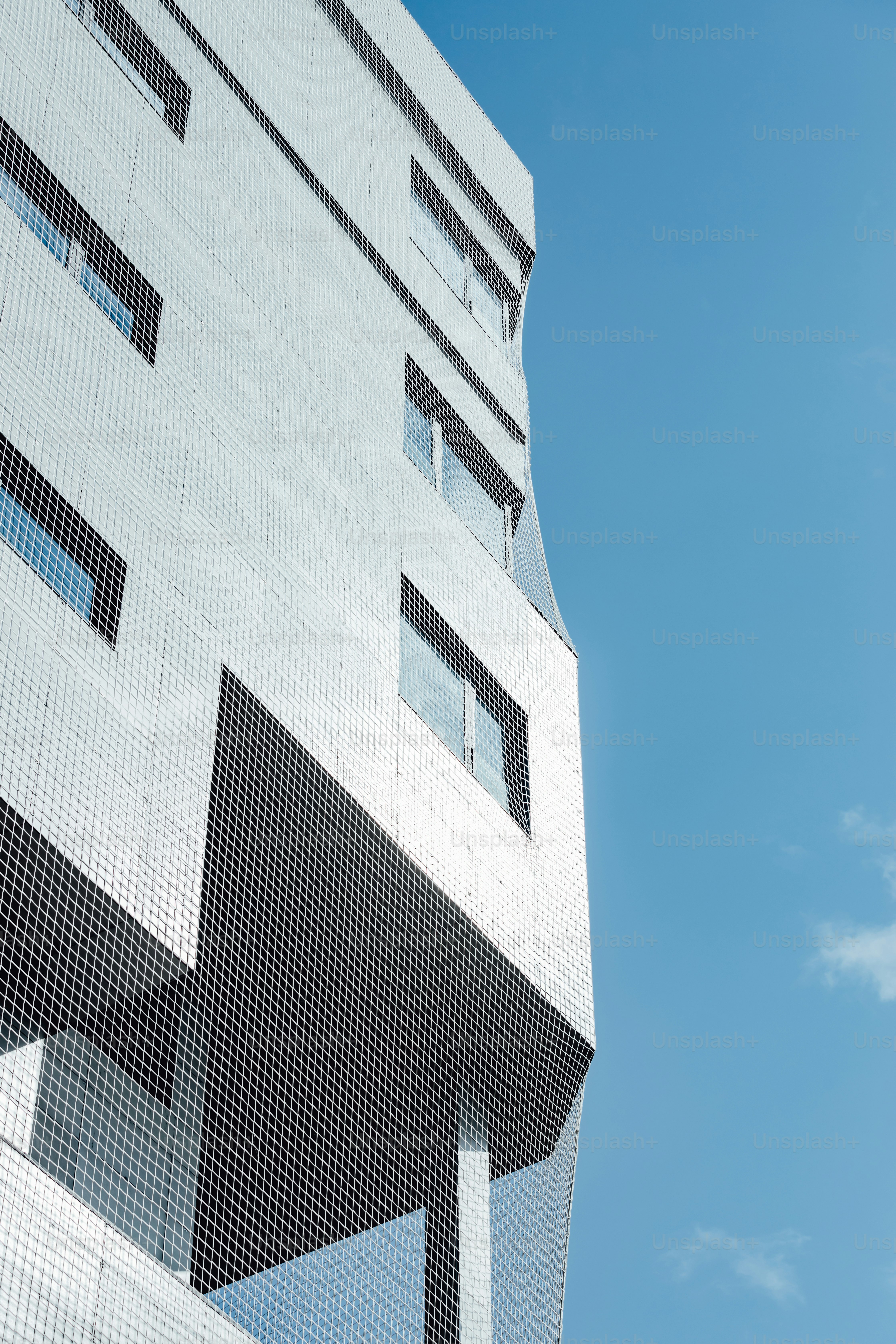 a very tall building with some windows on it's side