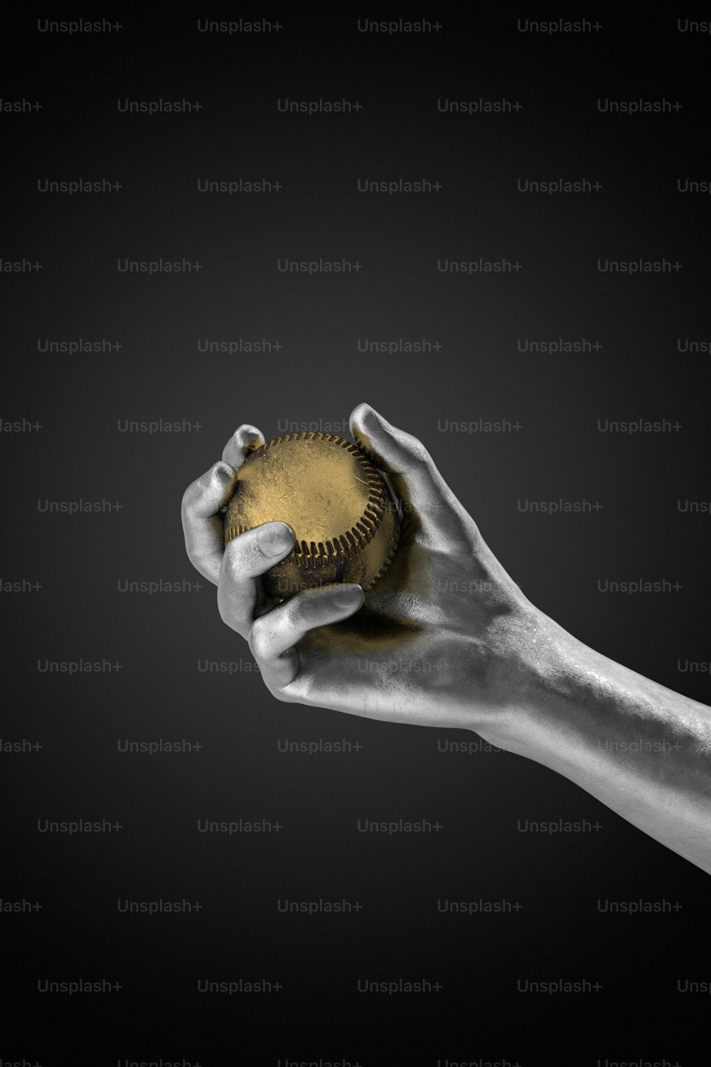 a person holding a baseball in their hand