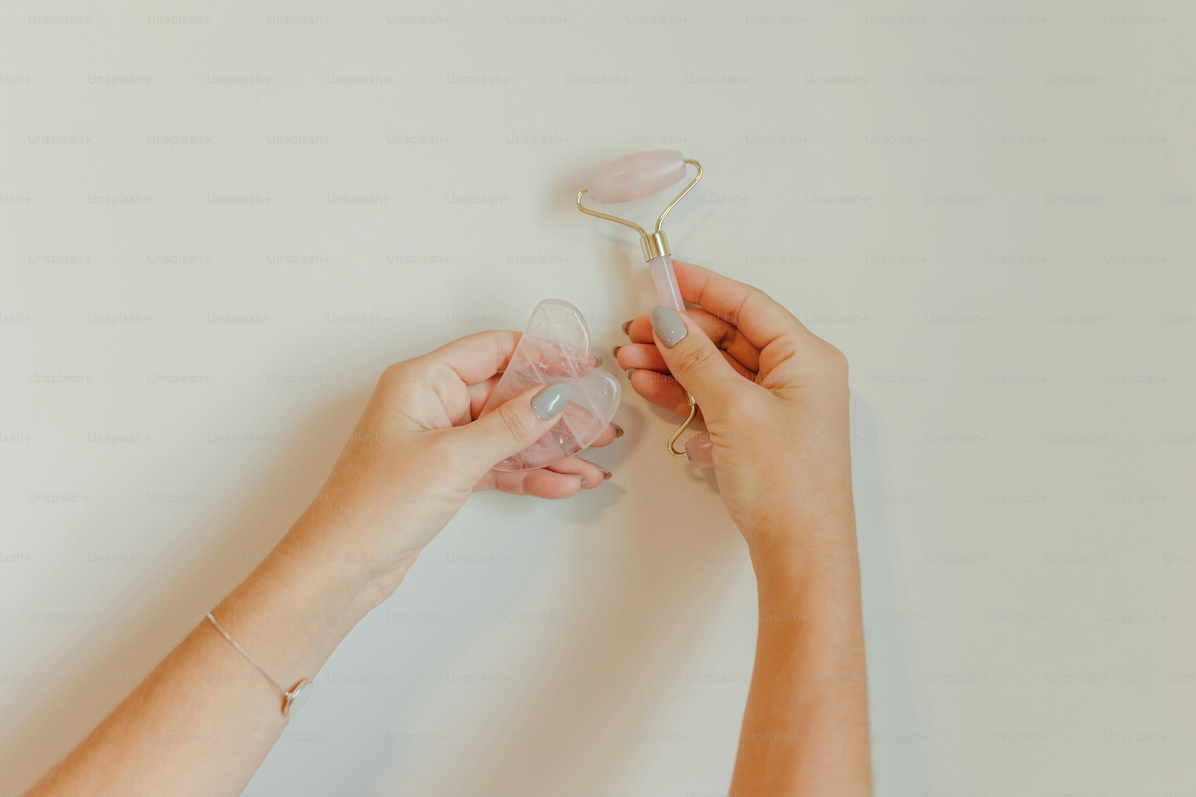 Two hands are holding a toothbrush and a toothpaste tube photo – Beauty ...