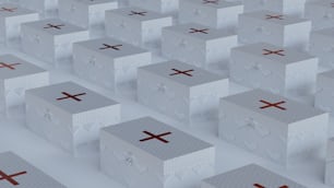 um grande grupo de caixas brancas com cruzes sobre elas
